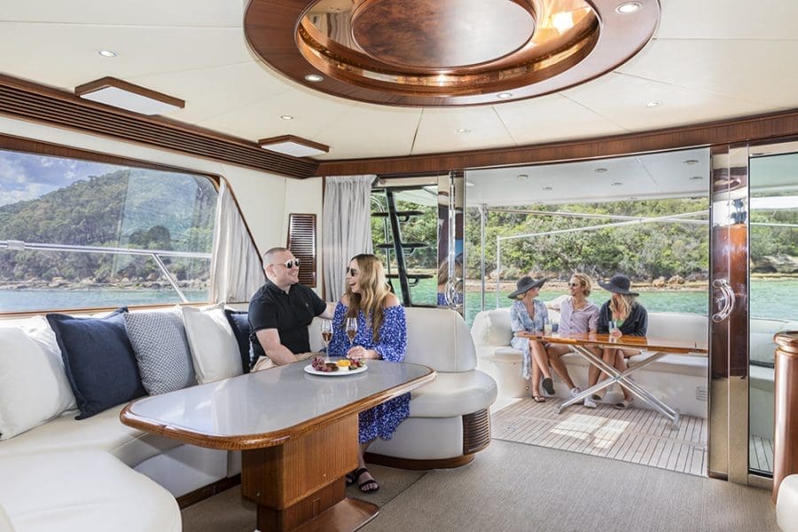 Lifestyle Charters Enigma indoor and outdoor dining areas Hire Privacy Boat Sydney